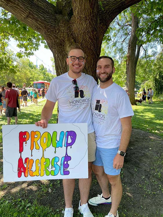 Male Nurses With Sign